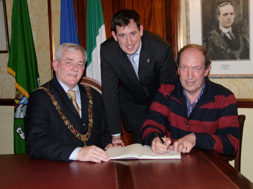 Cork Royal Lifesaving Club tutor John McCarthy and his son Cllr Kieran McCarthy, centre, with Lord Mayor of Cork, Cllr. Michael O'Connell, 26 January 2011, Lord Mayor's Room, Cork City Hall