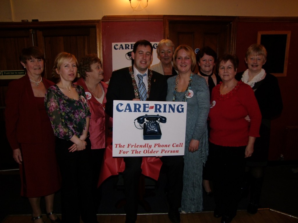 Cllr Kieran McCarthy, deputising for the Lord Mayor, with volunteers of Care-Ring, Douglas
