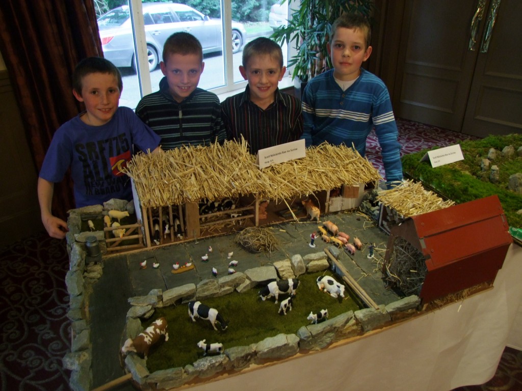 592a. View of students from Reenascreena National School, West Cork with their model of an old farm