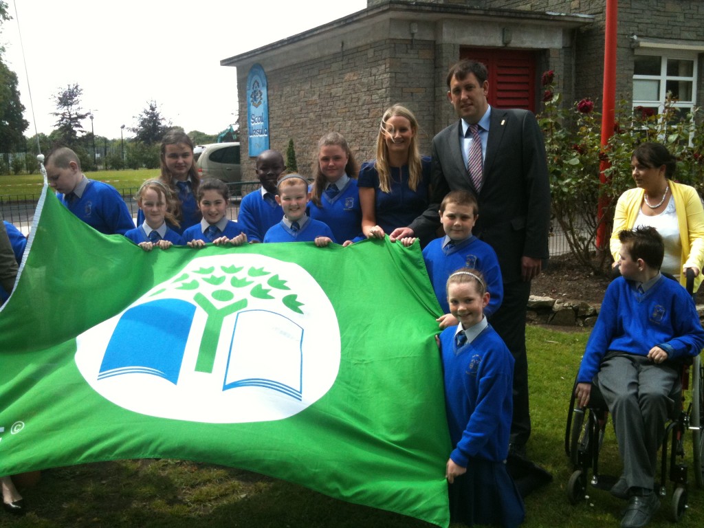 Cllr Kieran McCarthy with students and teachers at the raising of the Green Flag at Scoil Ursula, Blackrock, 14 June 2011