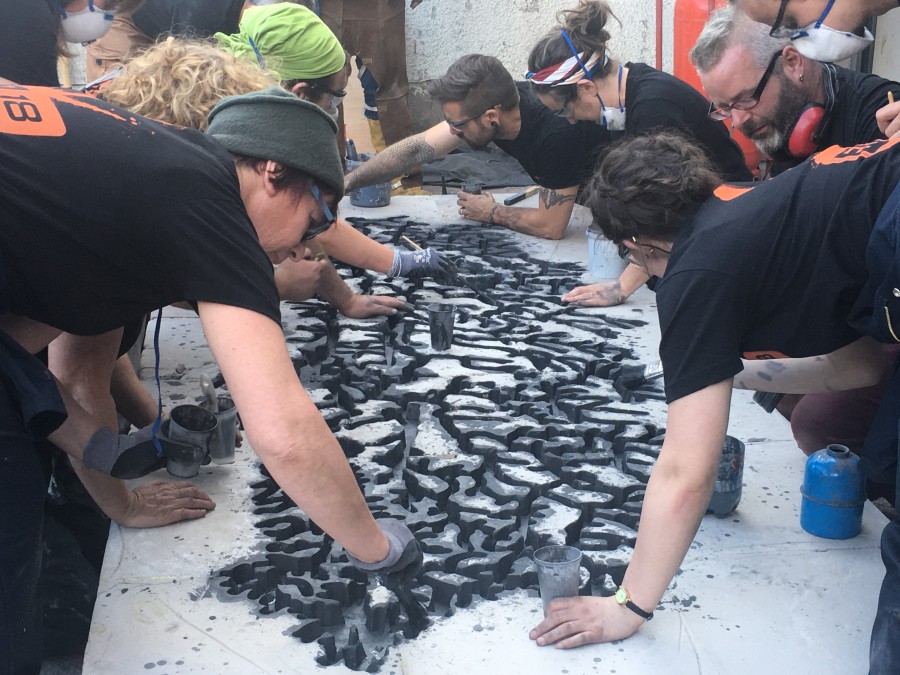 2. On Thursday, 19th July 2018, artist Tamsie Ringler Performed a iron pour During the IRON-R 2018 iron casting workshop in connection with Crawford College of Art and Design and the National Sculpture Factory in Cork, Ireland. The piece depicts the tributary system of county Cork's river Lee.